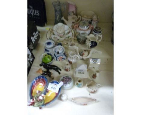 A collection of small ceramic items to include crested ware, Wedgwood, Royal Worcester majolica, moustache cup etc
