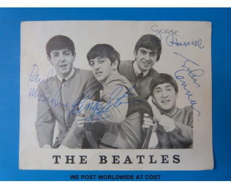 A signed Beatles postcard with signatures in pen by George, Ringo, Paul and John. The vendor obtained the signatures directly