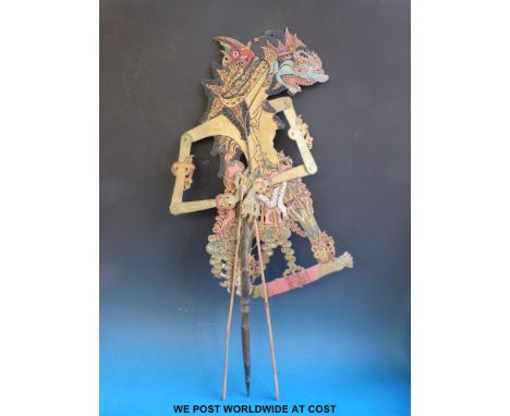 A 19thC Wayang Kulit Indonesian hide puppet depicting "Kuda" (78cm tall)