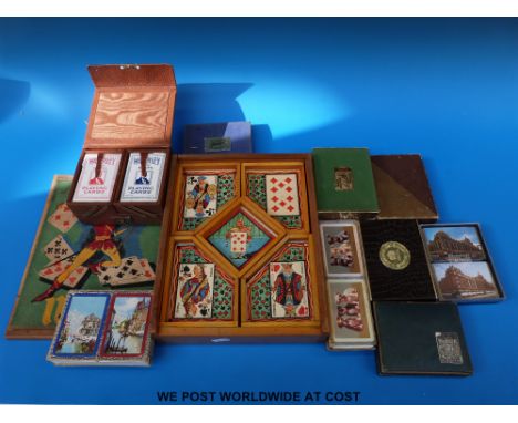 A quantity of mid-20thC quantity of double playing card games, game sets etc, some mint examples