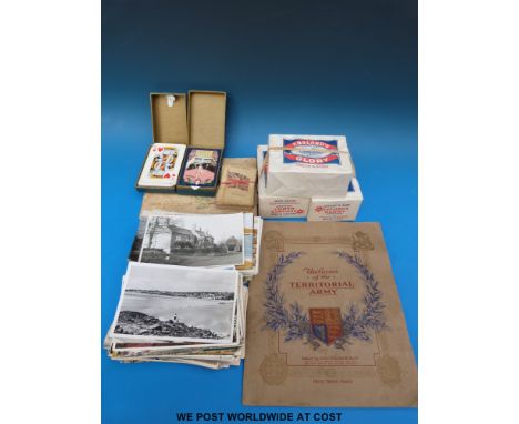 A collection of postcards, including UK topographical together with three unopened multi-packs of England's Glory Moreland Gl