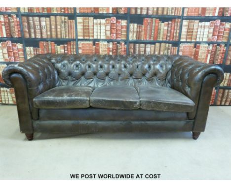 A three seat button back Chesterfield sofa (w209cm) 