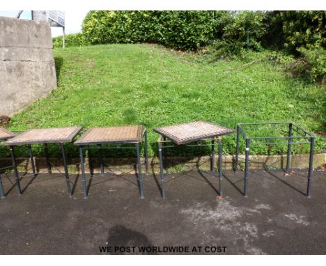 Four tile-topped conservatory or garden tables
