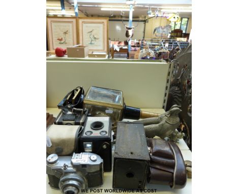 Six vintage cameras together with a pair of metal pheasants and chicks, a brass carriage lamp etc