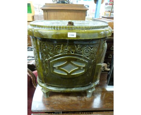 A French enamel log burning stove by Deville & Co 