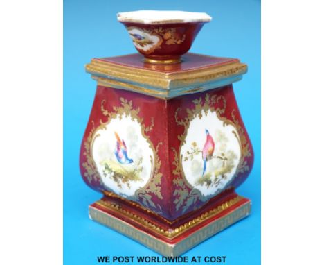 A Coalport lidded caddy/ pot pourri of bombe shape, decorated with exotic birds (height 11cm)