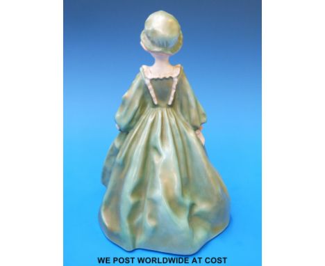 A Royal Worcester figurine Grandmother's Dress (height 17.4cm) and two Royal Worcester figurines each First Dance in differen