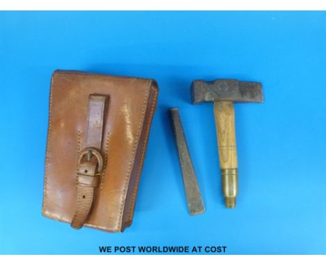 A leather cased campaign, geological or fossil hunting hammer and chisel set, the handle with brass screw on fittings, marked