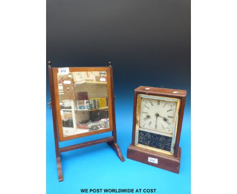 A small swing frame dressing table mirror and an American mantel clock