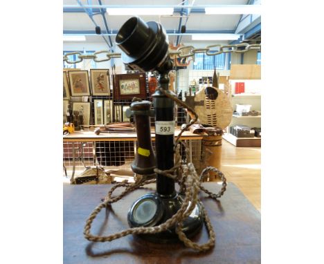 A vintage candlestick telephone with bakelite fittings, marked no 2 150