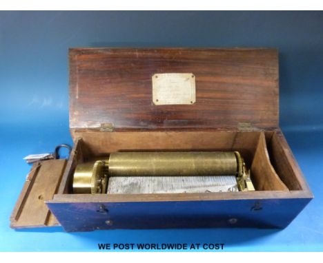 A cylinder musical box by 'Henriot' of Geneva c1850 in a plain case with drop down flap covering the three controls, stop/sta