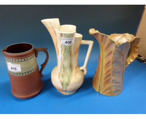 A group of three ceramic jugs to include Royal Worcester blush ivory, Beswick  and Watcombe 