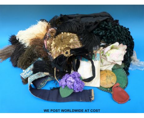 A collection of Victorian clothing, hats, feathers, clips, compact etc